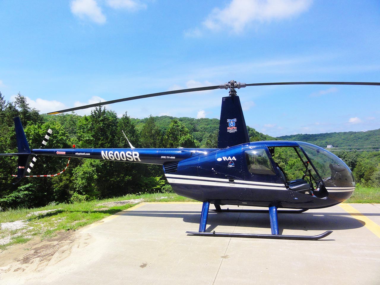 Robinson R44 Helicopter on Helipad