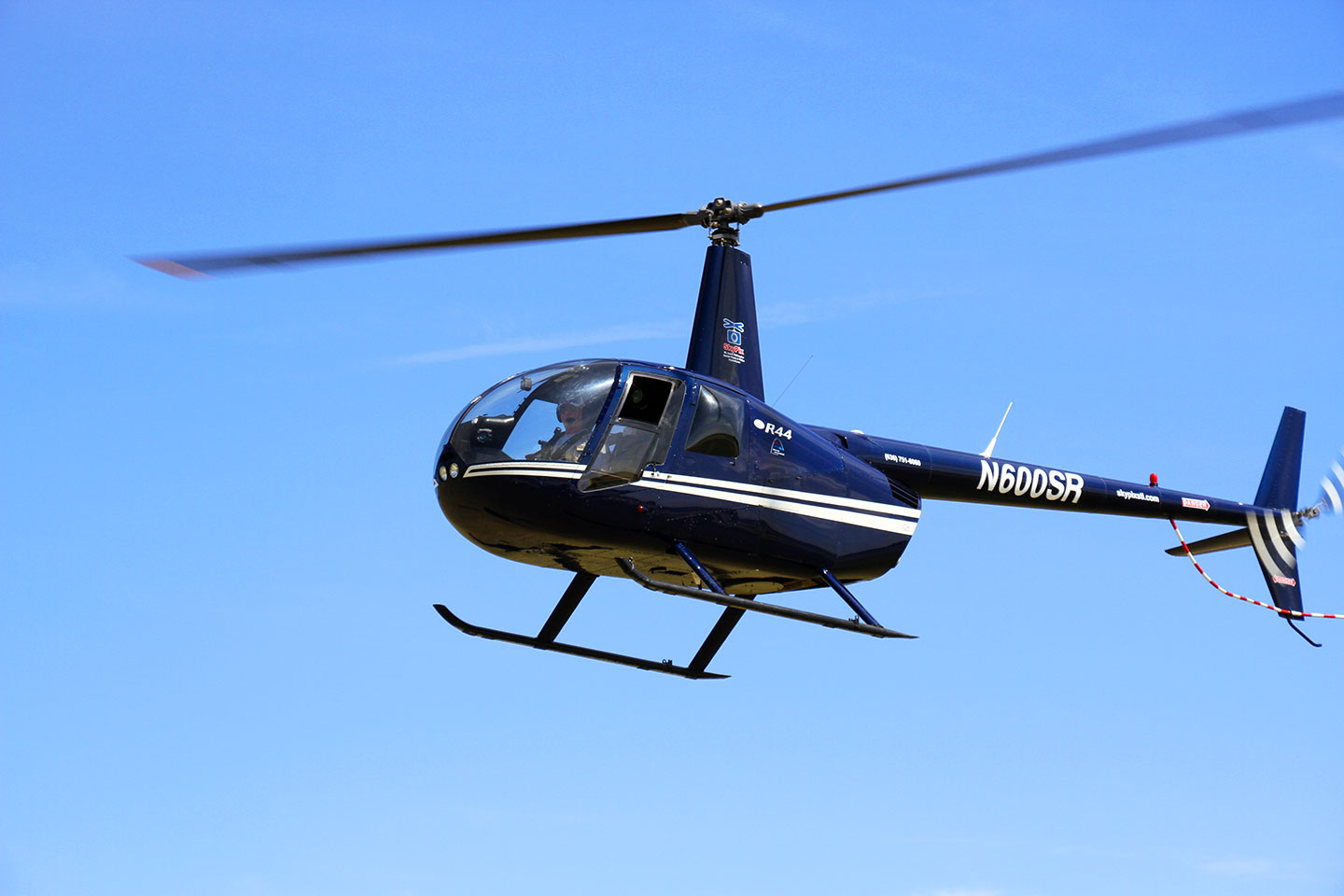 Robinson R44 Helicopter in Flight